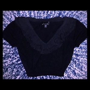Black short sleeved Bebe sweater